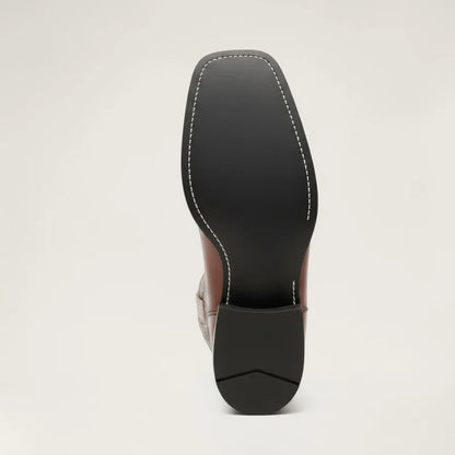 Yehaw BILLY brown vegan leather cowboy boots showing the black rubber sole and low heel from a bottom view.