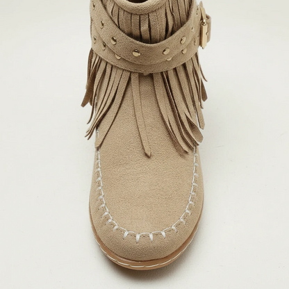 Yehaw beige vegan suede ankle cowgirl boots with fringe detail, side buckle, and flat rubber sole