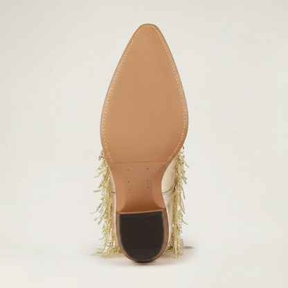 Yehaw gold vegan leather mid-calf cowgirl boots with long shimmering fringe and a pointed toe.