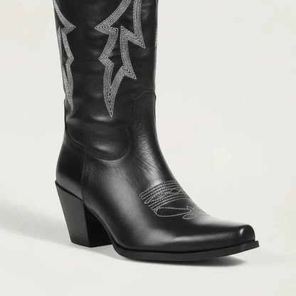 Yehaw BEATRICE black vegan leather knee-high cowgirl boots with white western embroidery and a pointed toe.