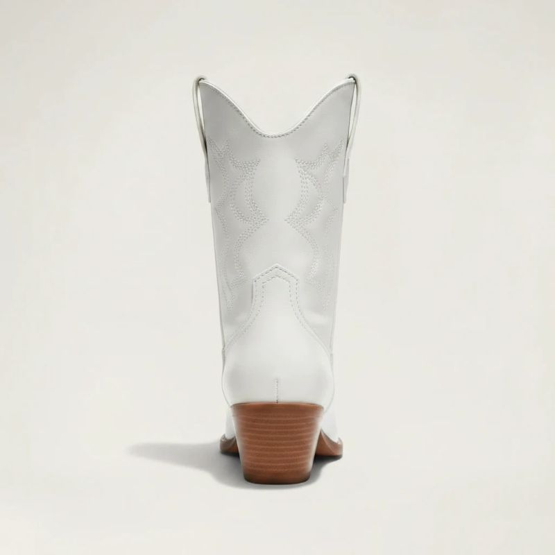 Yehaw white vegan leather ankle-height cowgirl boots with pointed toe and medium block heel.