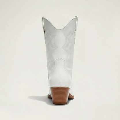Yehaw white vegan leather ankle-height cowgirl boots with pointed toe and medium block heel.