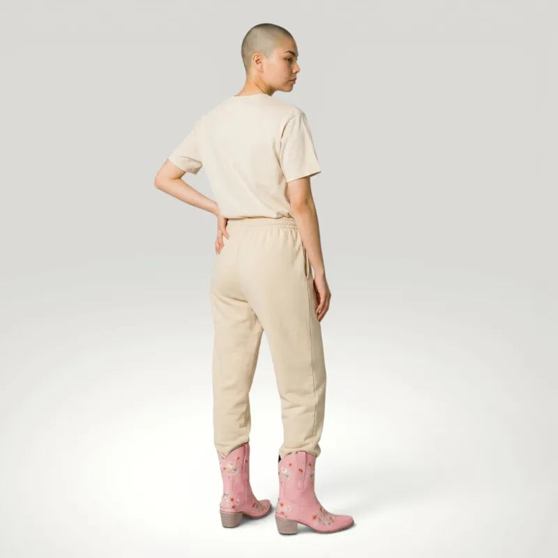 Yehaw pink vegan leather ankle-height cowgirl boots with floral embroidery and pointed toe.