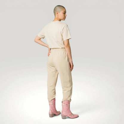 Yehaw pink vegan leather ankle-height cowgirl boots with floral embroidery and pointed toe.