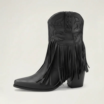 Yehaw DALIA black vegan leather ankle cowgirl boots with fringe detailing and a pointed toe on a neutral background.