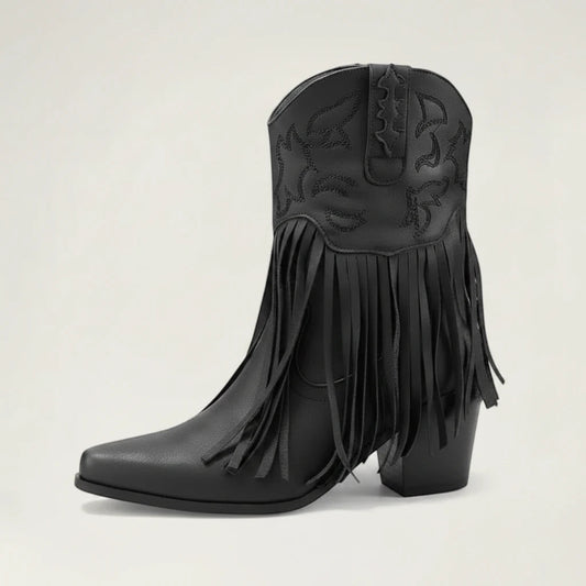 Yehaw DALIA black vegan leather ankle cowgirl boots with fringe detailing and a pointed toe on a neutral background.