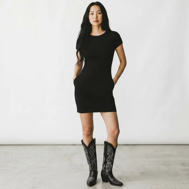 Yehaw black vegan leather mid-calf cowgirl boots with pointed toe and ornate white stitching.