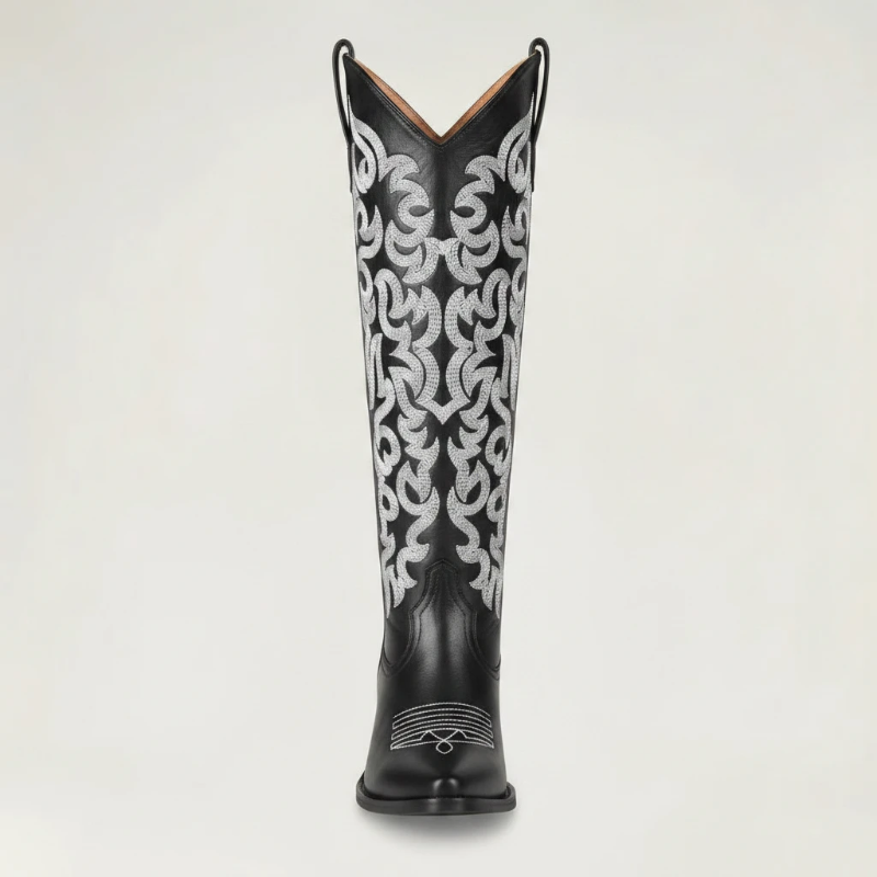 Yehaw CELIA black vegan leather mid-calf cowgirl boots with intricate silver western embroidery and a pointed toe.