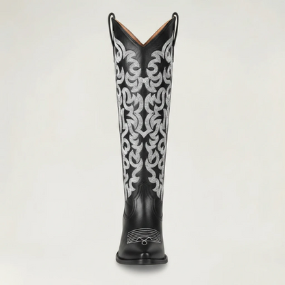 Yehaw CELIA black vegan leather mid-calf cowgirl boots with intricate silver western embroidery and a pointed toe.