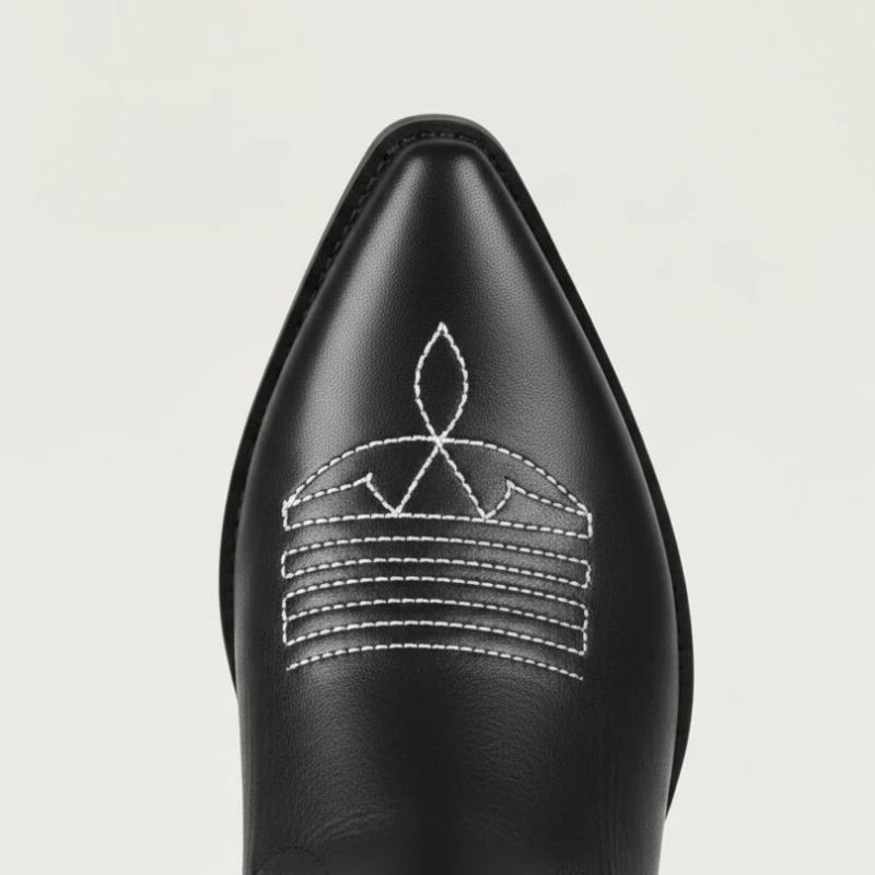 Yehaw CELIA black vegan leather mid-calf cowgirl boots with intricate silver western embroidery and a pointed toe.