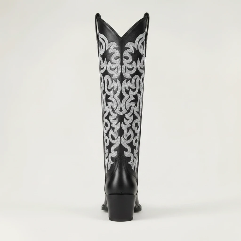 Yehaw CELIA black vegan leather mid-calf cowgirl boots with intricate silver western embroidery and a pointed toe.