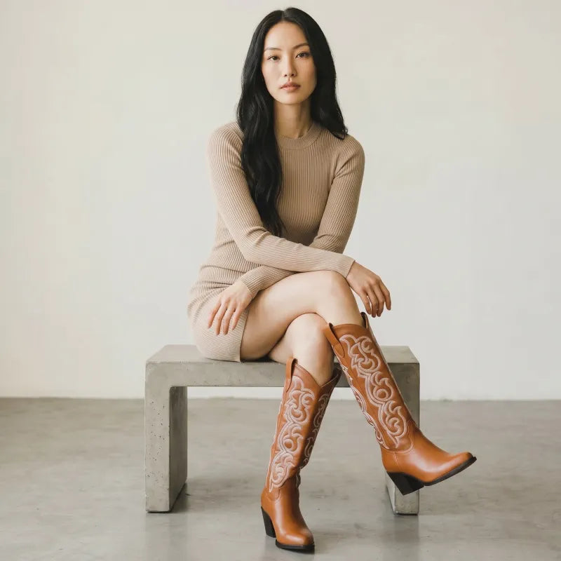 Yehaw brown vegan leather mid-calf cowgirl boots with pointed toe and white stitching detail.