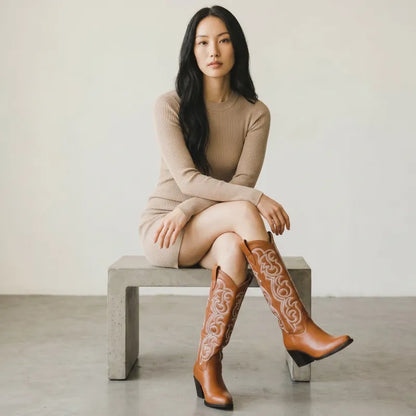 Yehaw brown vegan leather mid-calf cowgirl boots with pointed toe and white stitching detail.