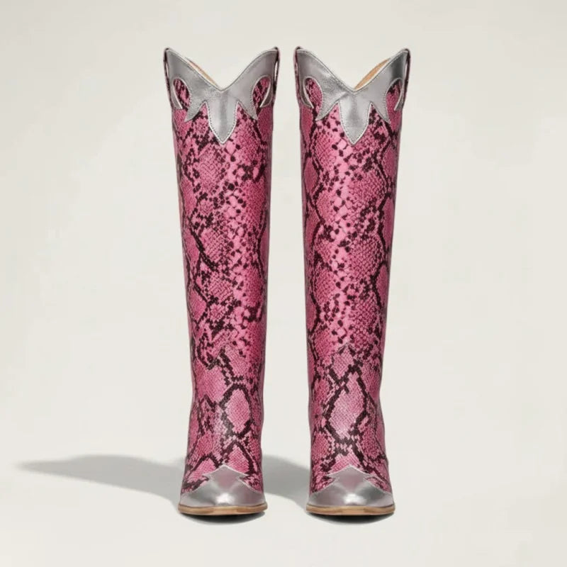 Yehaw Clementine knee-high cowgirl boots in pink and silver snakeskin-pattern vegan leather with a pointed toe.