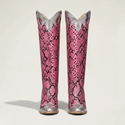 Yehaw Clementine knee-high cowgirl boots in pink and silver snakeskin-pattern vegan leather with a pointed toe.