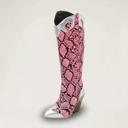 Yehaw Clementine knee-high cowgirl boots in pink snakeskin vegan leather with silver metallic accents and pointed toe.
