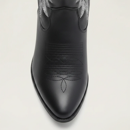 Yehaw CARMELA black vegan leather ankle cowgirl boots with white western embroidery, side zip, and medium block heel.