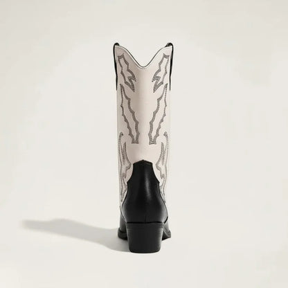 Yehaw Daniela mid-calf vegan leather cowgirl boots in black and white with western stitching, back view.