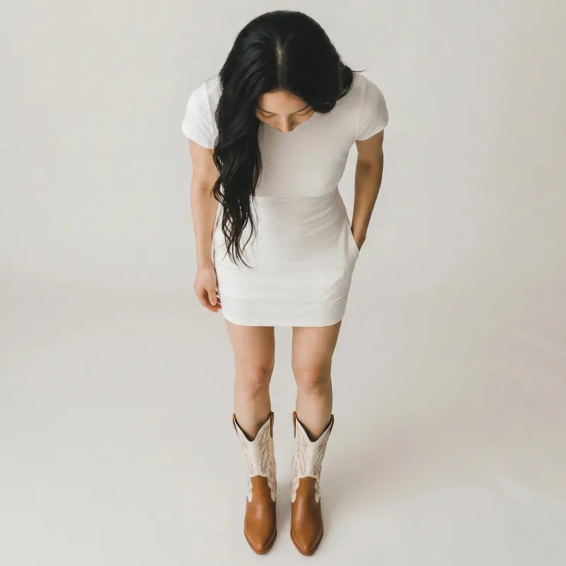 Yehaw Daniela brown and white vegan leather mid-calf cowgirl boots with pointed toe and slip-on closure.