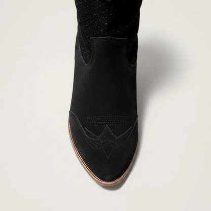 Yehaw black vegan leather ankle cowgirl boots with a perforated shaft and a medium block heel.