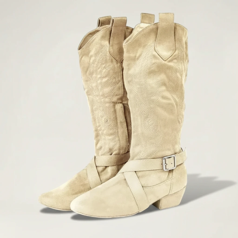 Yehaw beige vegan suede mid-calf cowgirl boots with a round toe, low heel, and decorative buckle strap detail.