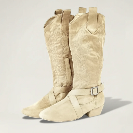 Yehaw beige vegan suede mid-calf cowgirl boots with a round toe, low heel, and decorative buckle strap detail.