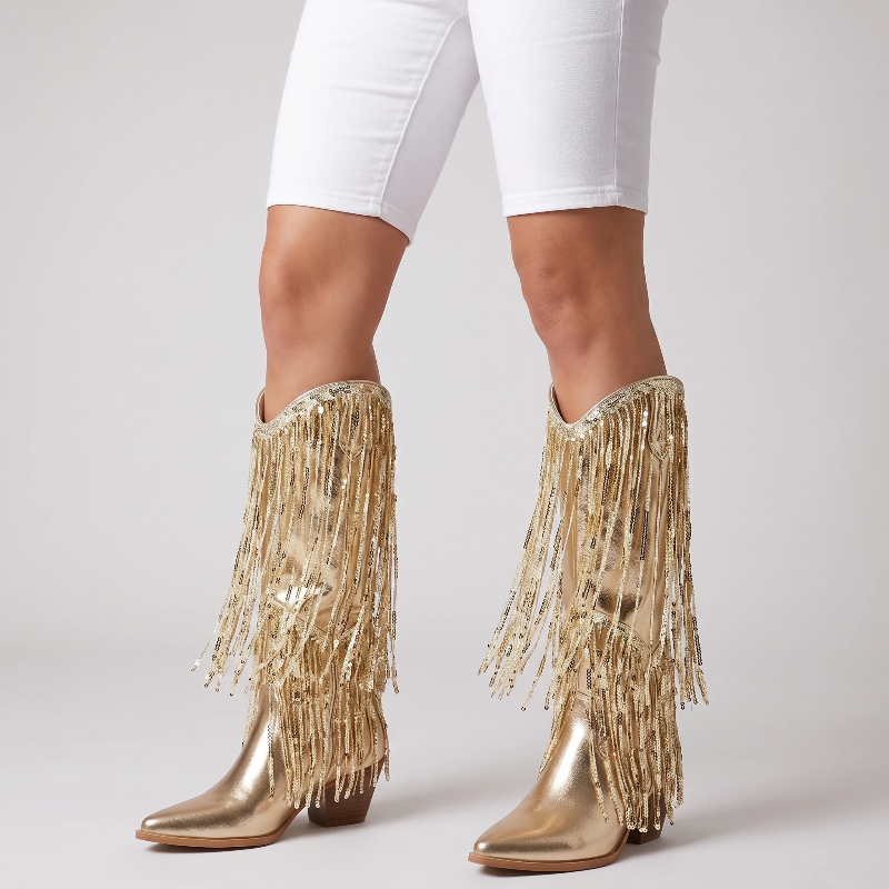 Yehaw gold vegan leather mid-calf cowgirl boots with long shimmering fringe and a pointed toe.