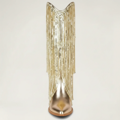 Yehaw gold vegan leather mid-calf cowgirl boots with long shimmering fringe and a pointed toe.