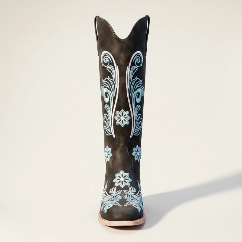 Yehaw Adriana black vegan suede mid-calf cowgirl boots with intricate light blue floral embroidery and a round toe.