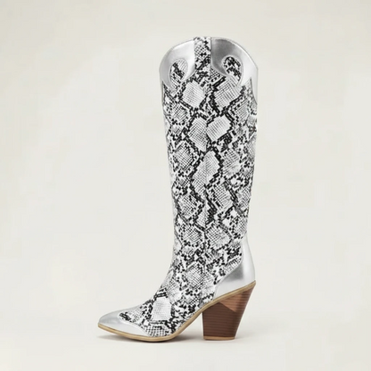 Yehaw Clementine knee-high cowboy boots in silver and black snakeskin-print vegan leather with a pointed toe