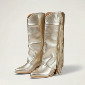 Yehaw gold knee-high cowgirl boots with fringe detail, made from vegan microfibre with a round toe and medium heel.