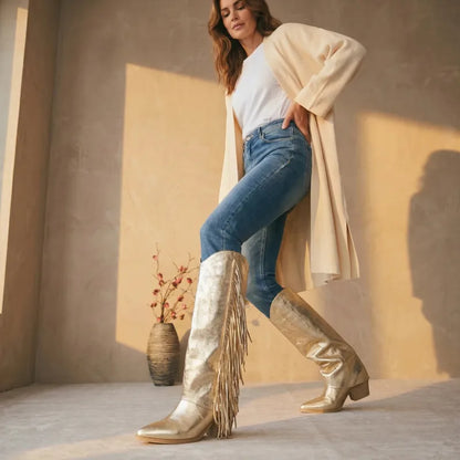 Yehaw gold knee-high cowgirl boots with fringe detail, made from vegan microfibre.
