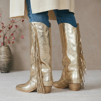Yehaw gold knee-high vegan microfibre cowgirl boots with fringe detail and medium heel.