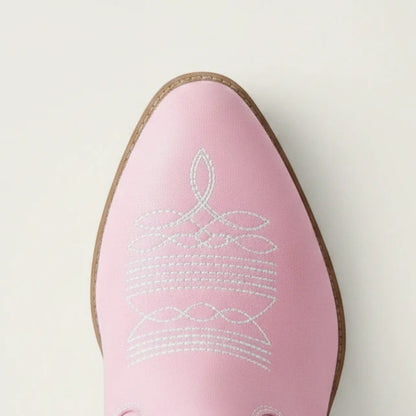 Yehaw pink vegan leather ankle cowgirl boots with white western stitching and a pointed toe