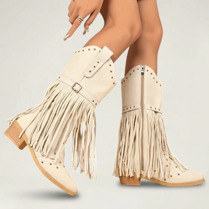 Yehaw beige vegan leather mid-calf cowgirl boots with fringe detailing, round toe, and side zip closure.