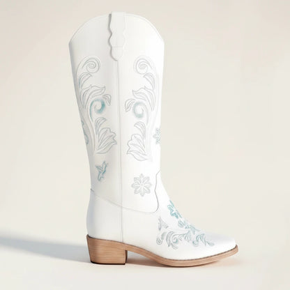 Yehaw ADRIANA white vegan suede mid-calf cowgirl boots with light blue floral embroidery and a medium block heel.