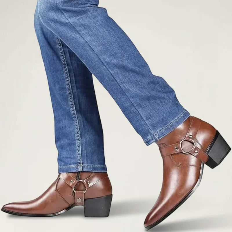 Yehaw brown vegan leather ankle cowboy boots with pointed toe, side zip, and harness detail worn with blue jeans.