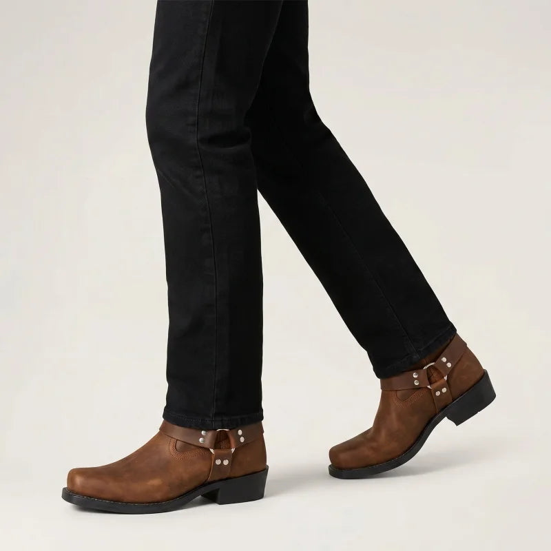 Yehaw brown vegan leather mid-calf cowboy boots with square toe and harness detail worn with black jeans