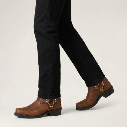 Yehaw brown vegan leather mid-calf cowboy boots with square toe and harness detail worn with black jeans