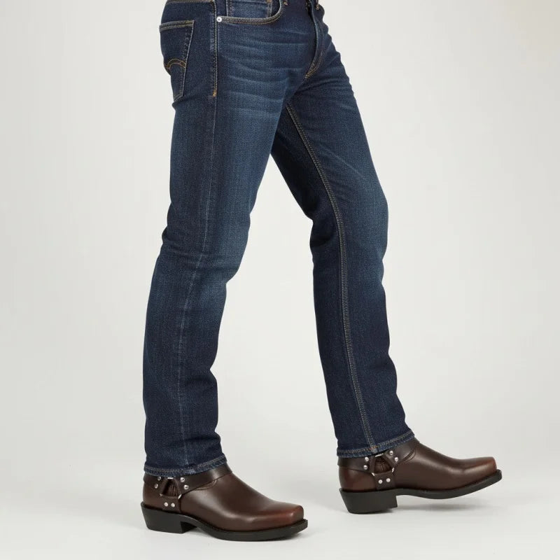 Yehaw dark brown vegan leather cowboy boots with square toe and studded harness detail worn with blue jeans