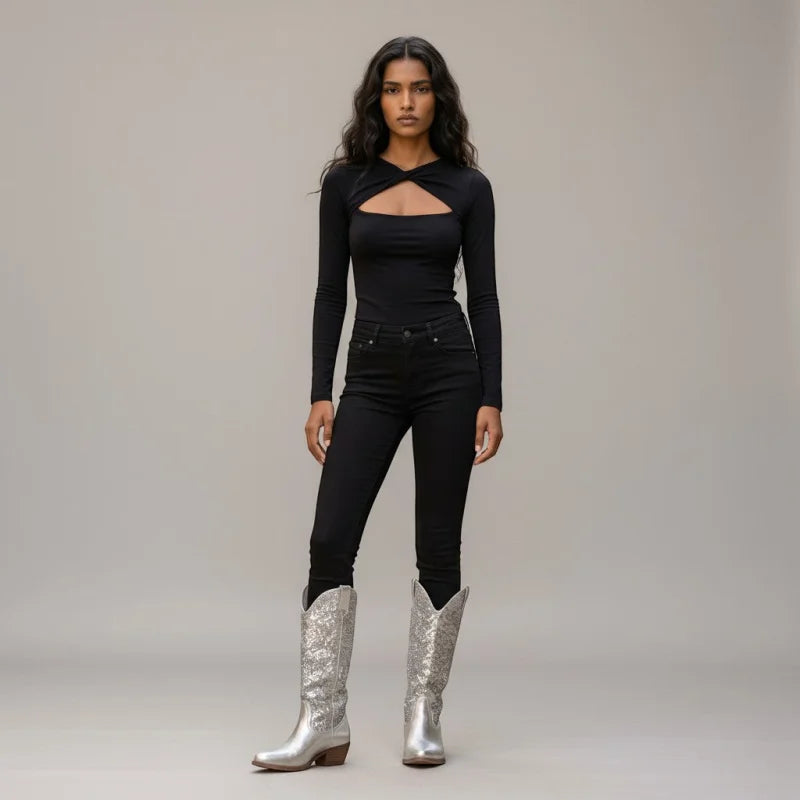 Model wearing Yehaw silver vegan microfibre mid-calf cowgirl boots with a round toe and low heel