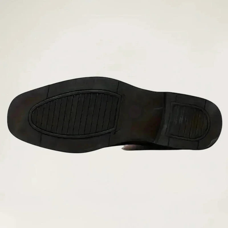Yehaw brown vegan leather cowboy boots with a round toe and low heel worn by a man in black trousers