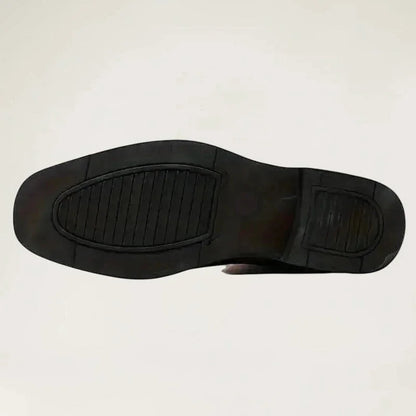 Yehaw brown vegan leather cowboy boots with a round toe and low heel worn by a man in black trousers
