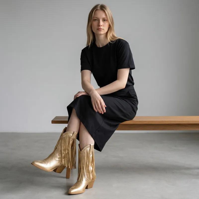 Yehaw gold vegan microfibre ankle-height cowgirl boots with pointed toe and fringe detail.