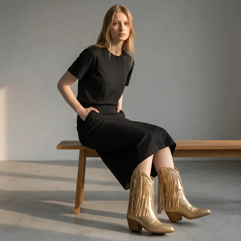 Yehaw gold vegan microfibre ankle-height cowgirl boots with fringe detail and pointed toe.