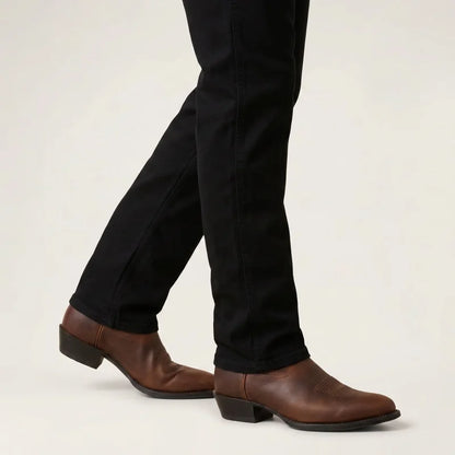 Yehaw brown vegan leather cowboy boots with a round toe and low heel worn with black jeans