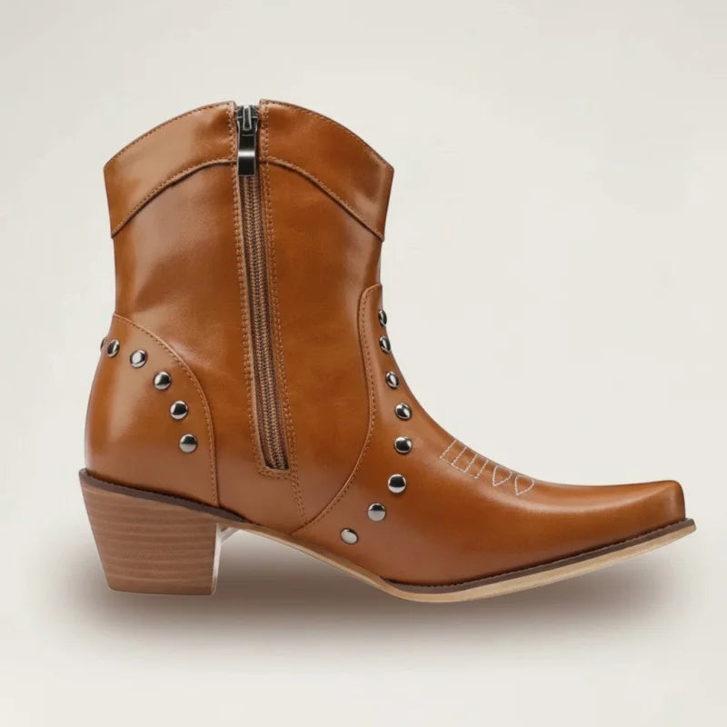 Yehaw brown vegan leather ankle cowboy boots with side zip, silver studs, and a pointed toe.
