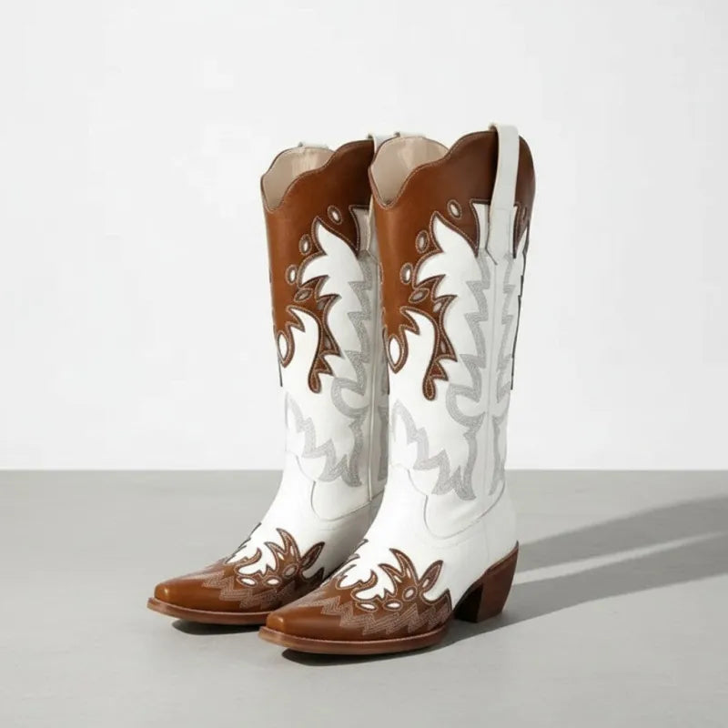 Yehaw brown and white vegan leather mid-calf cowgirl boots with pointed toe and western-style embroidery.