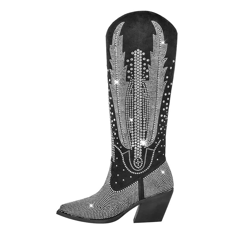 Black suede cowboy boot adorned with intricate silver rhinestone detailing forming a winged design